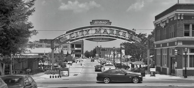 The Historic City Market arch over the street in the River Market, in black and white