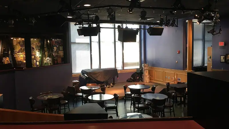 The stage and tables inside the Blue Room jazz club