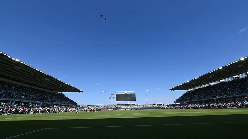 CPKC Stadium under a blue sky during a flyover