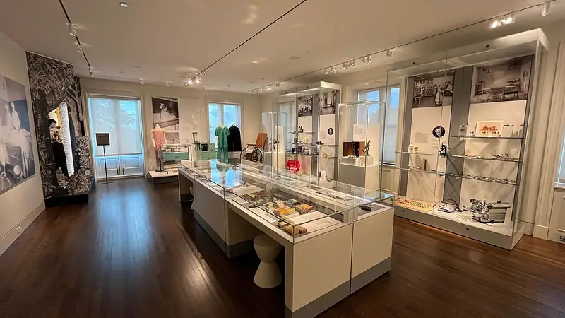 A gallery with display cases inside the Museum of Kansas City